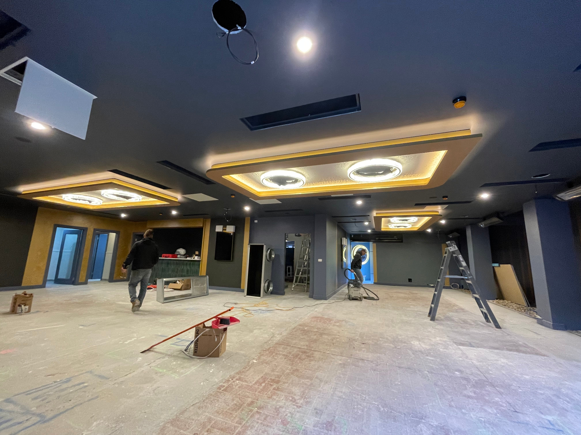 Wide venue fit-out with illuminated recessed ceiling features
